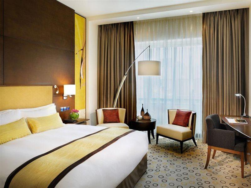 Asiana Hotel Dubai Luaran gambar A room at the hotel