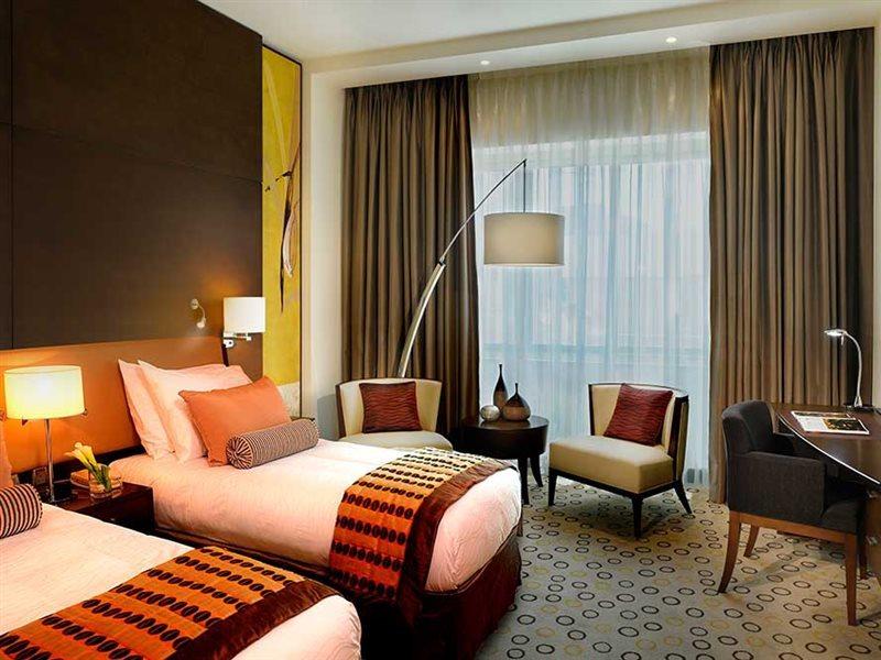 Asiana Hotel Dubai Luaran gambar A room at the hotel
