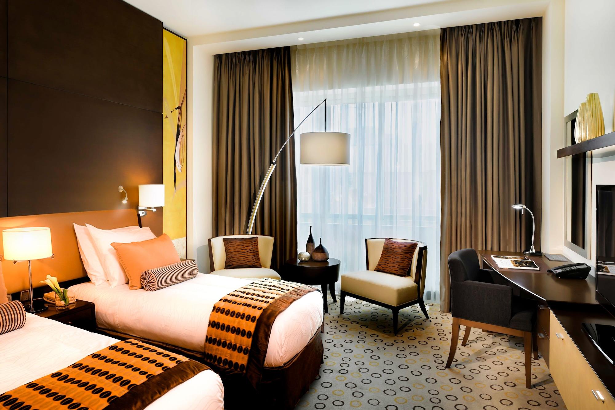 Asiana Hotel Dubai Luaran gambar A room at the hotel