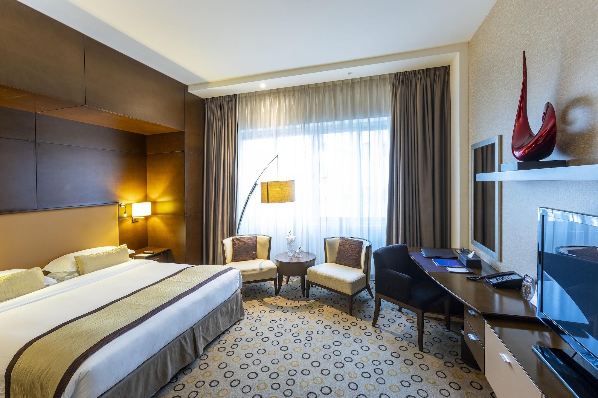 Asiana Hotel Dubai Luaran gambar A room at the hotel
