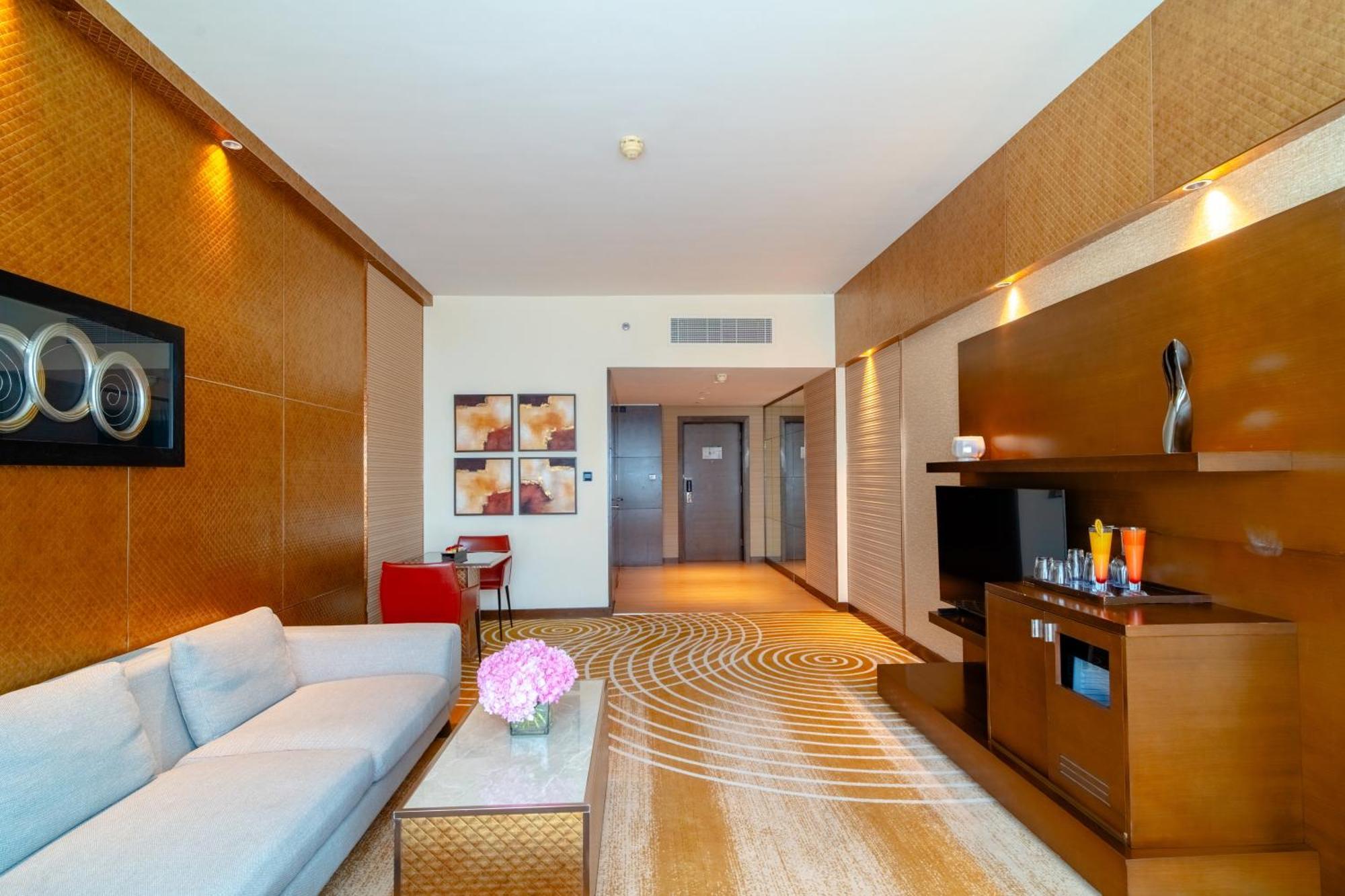 Asiana Hotel Dubai Luaran gambar A suite at the hotel