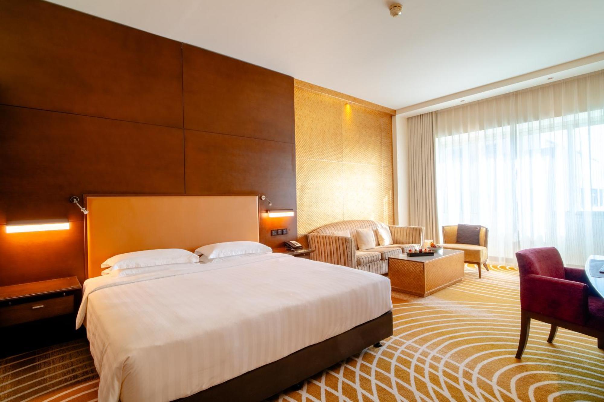 Asiana Hotel Dubai Luaran gambar A room at the hotel
