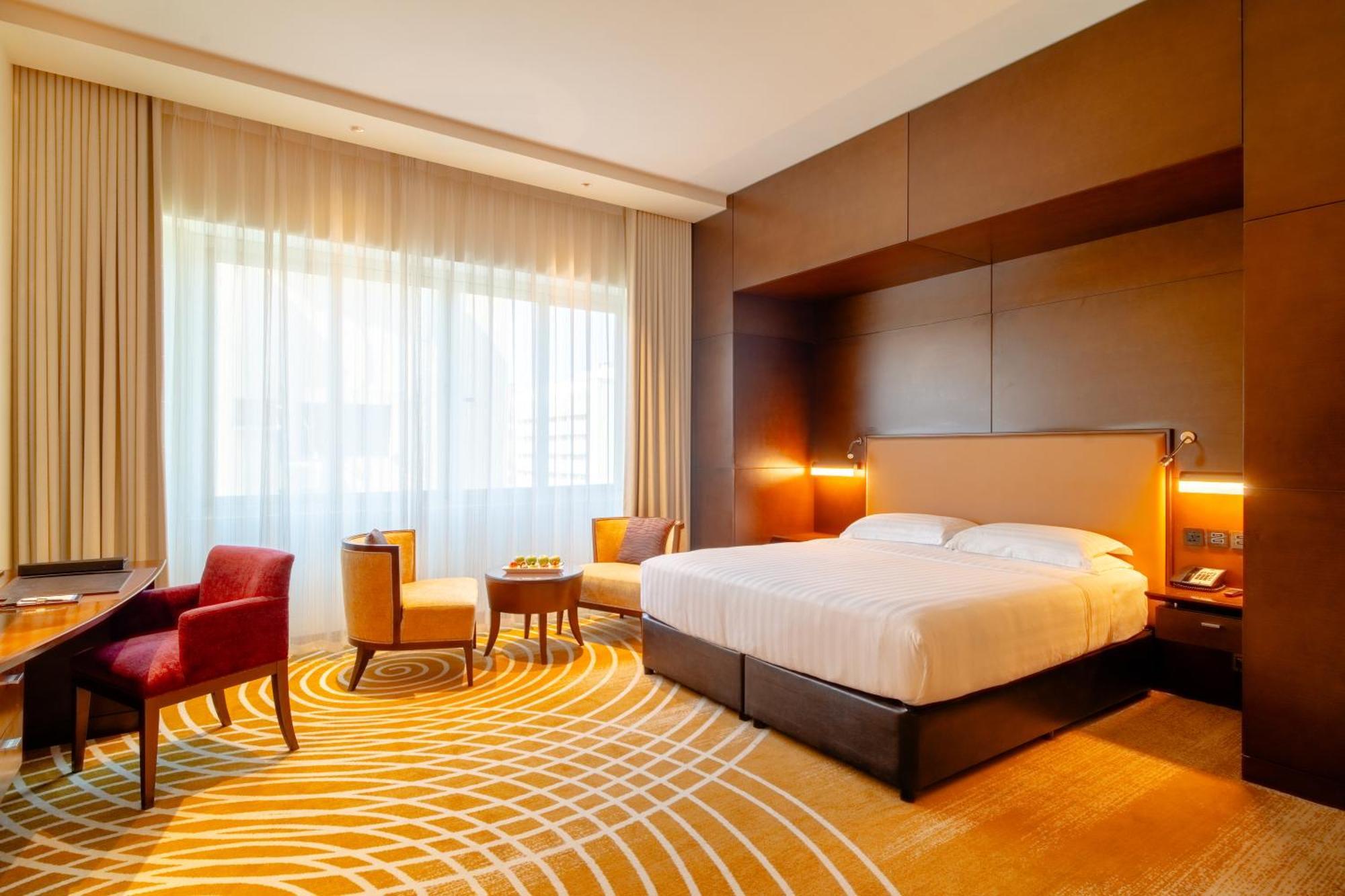 Asiana Hotel Dubai Luaran gambar A room at the hotel