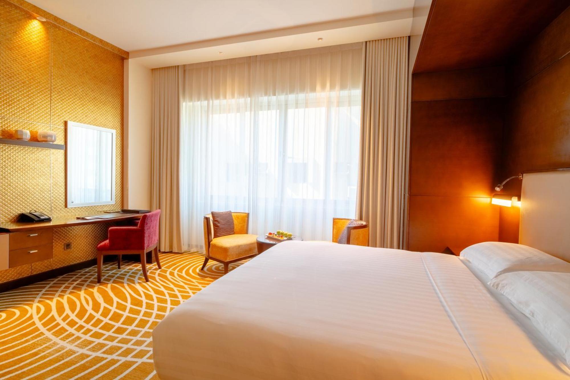 Asiana Hotel Dubai Luaran gambar A room at the hotel