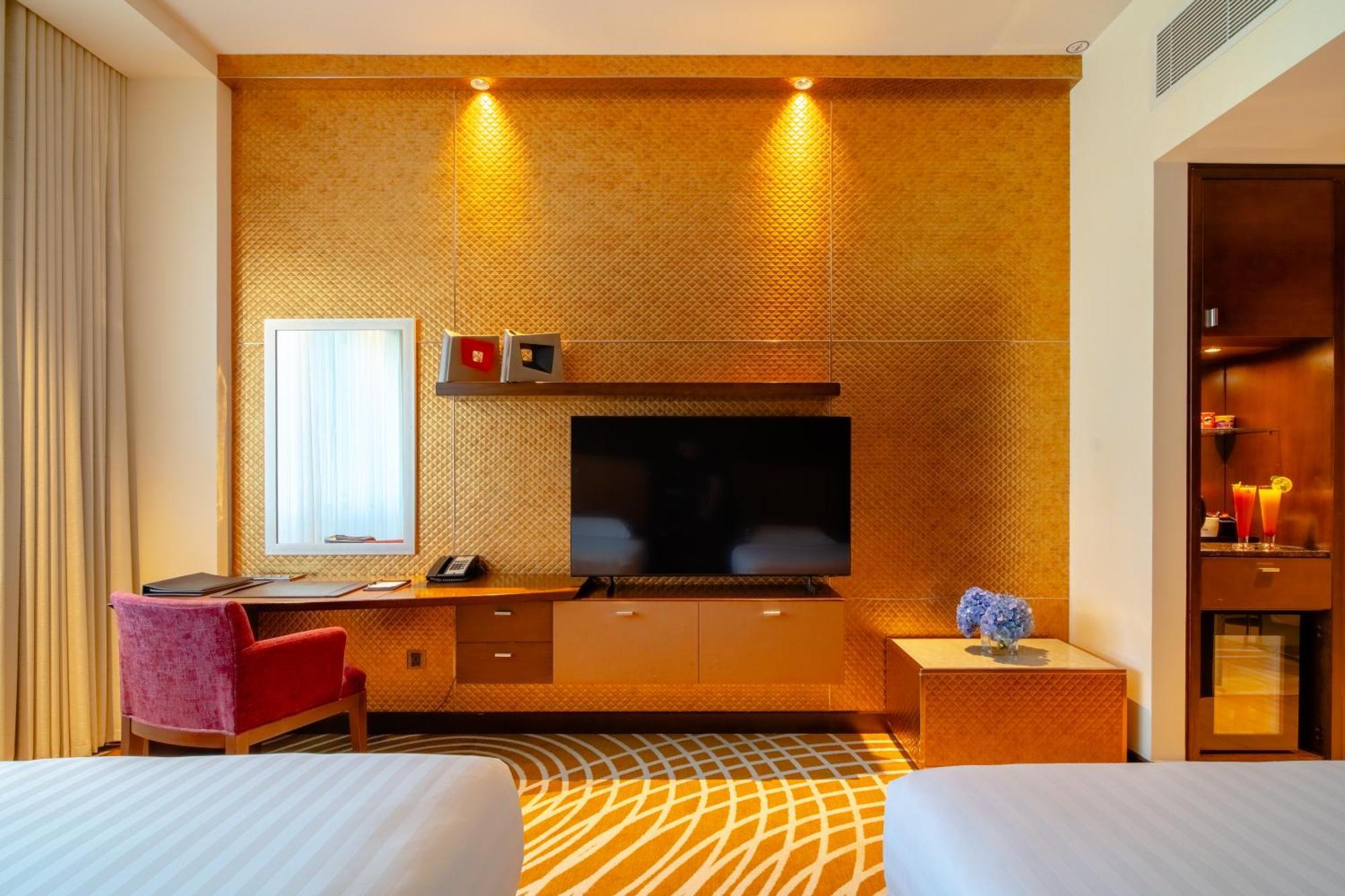 Asiana Hotel Dubai Luaran gambar A room at the hotel